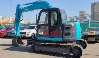 
										Kobelco 60 SR lleno									