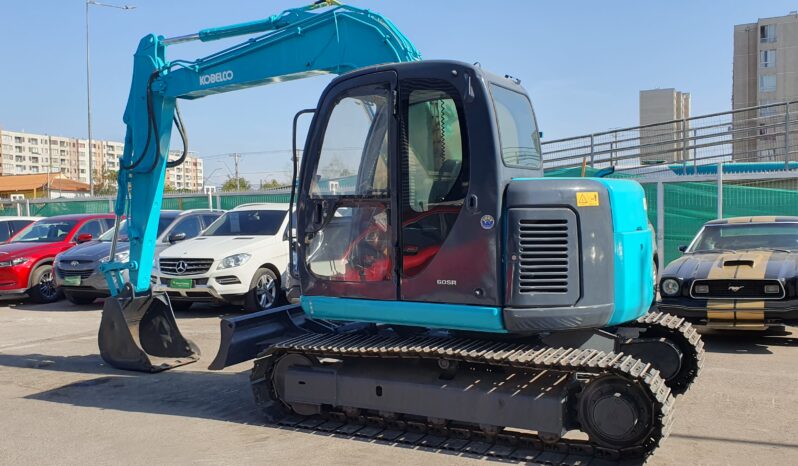 
								Kobelco 60 SR lleno									