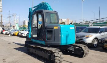 
										Kobelco 60 SR lleno									