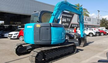 
										Kobelco 60 SR lleno									