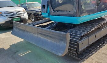 
										Kobelco 60 SR lleno									