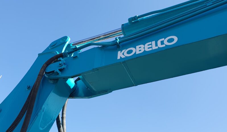 
								Kobelco 60 SR lleno									