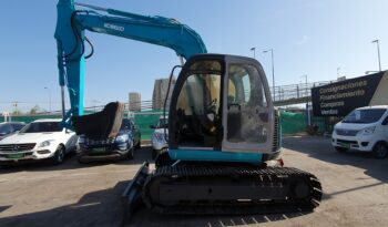 
										Kobelco 60 SR lleno									